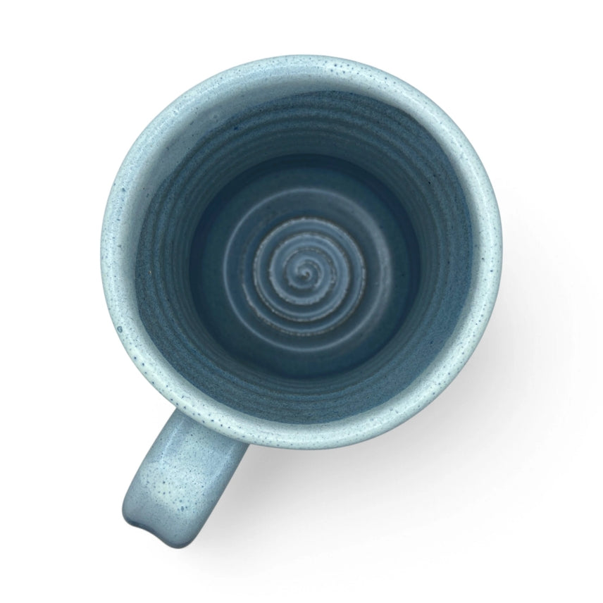 Blue ceramic mug on a white background