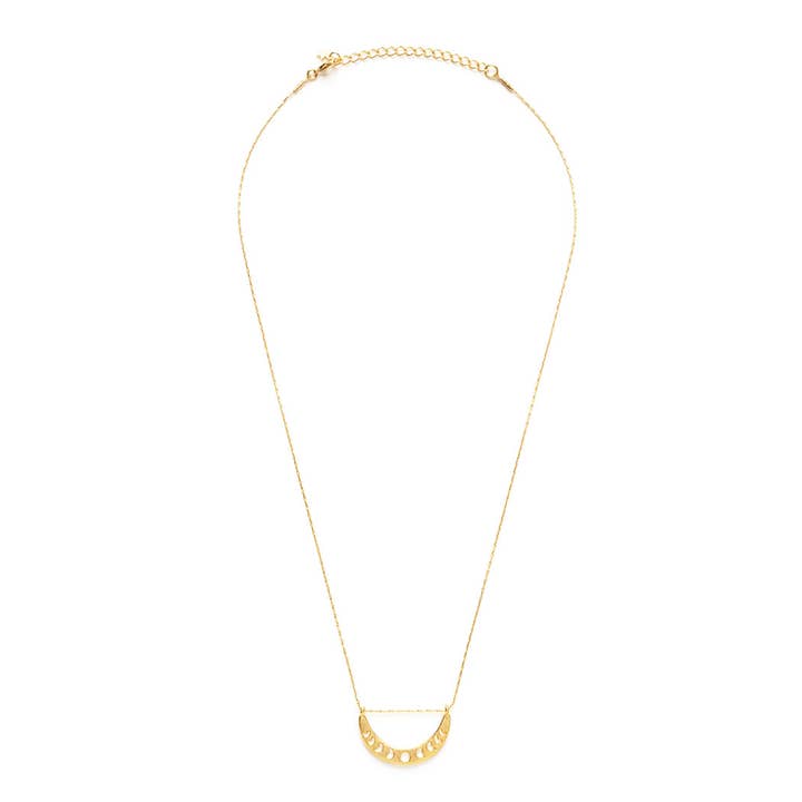 Gold necklace on a white background
