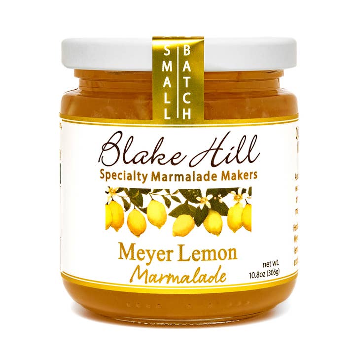 A jar of Blake Hill Meyer Lemon Marmalade with a white label featuring illustrations of lemons and a 'Small Batch' text.