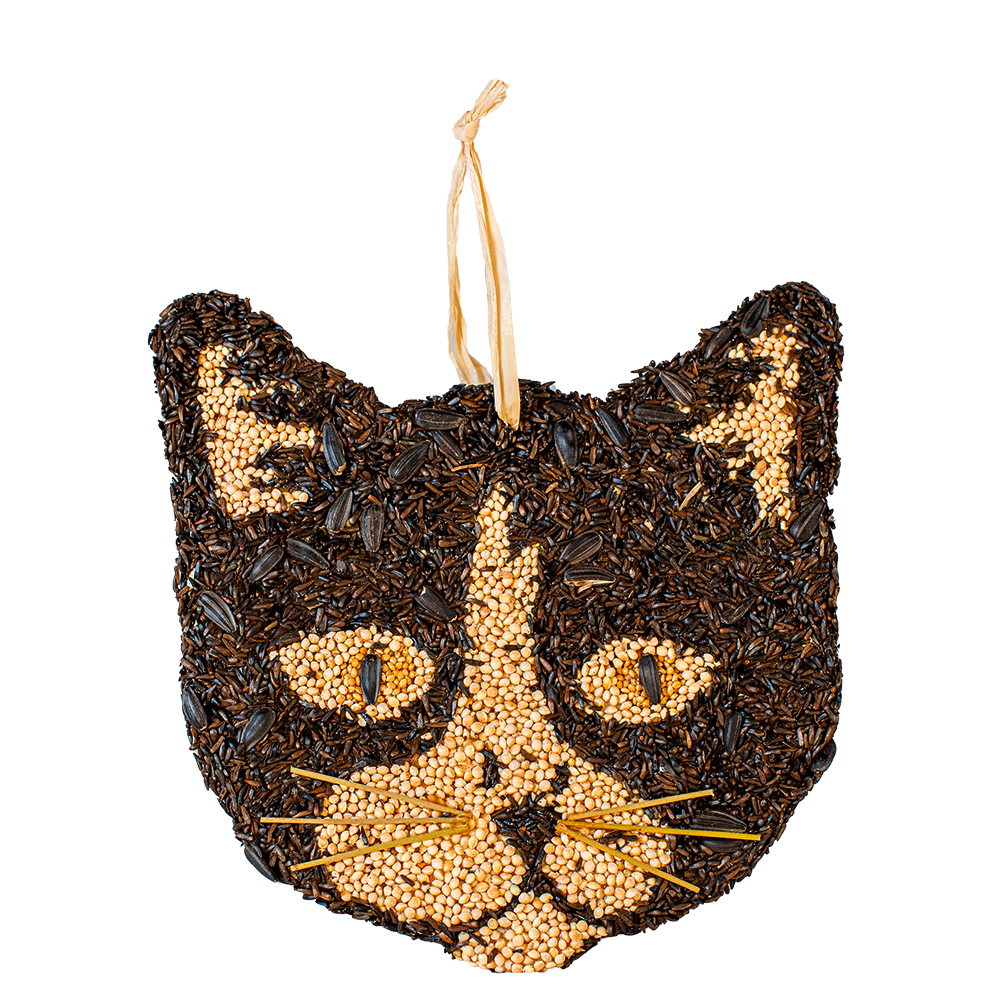 Cat-shaped seed ornament with black and gold design on a white background