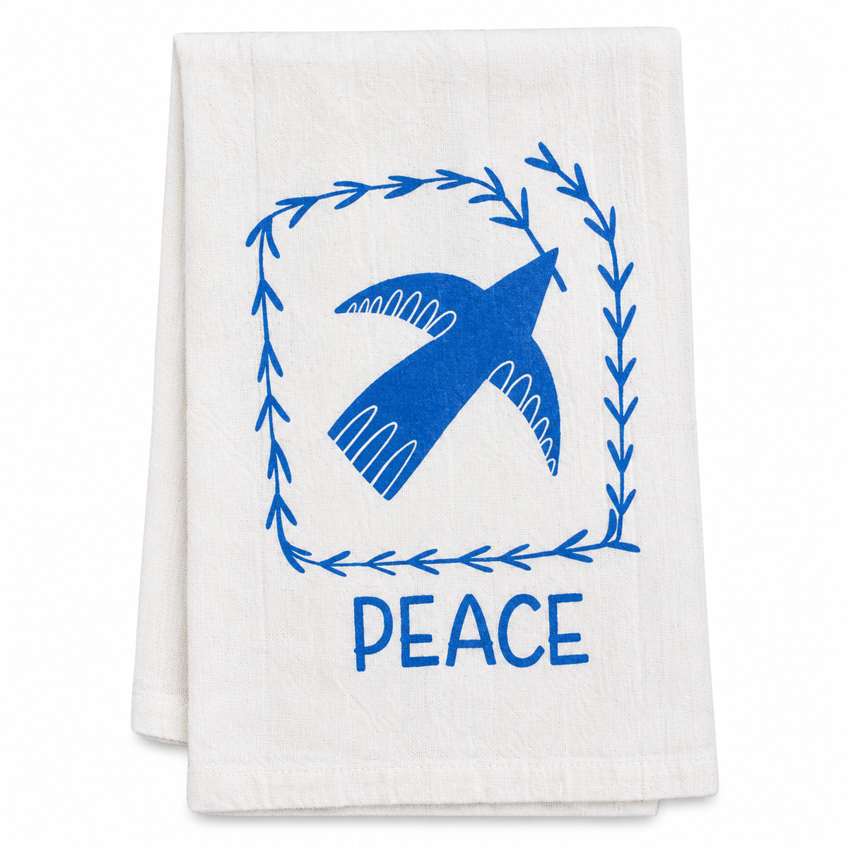 A cream colored tea towel with blue dove and peace design on a white background.