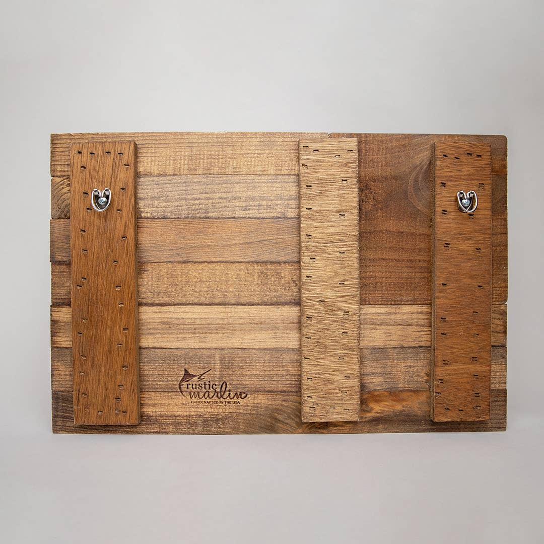 Wooden sign with 'Rustic Marlin' branding on a gray background