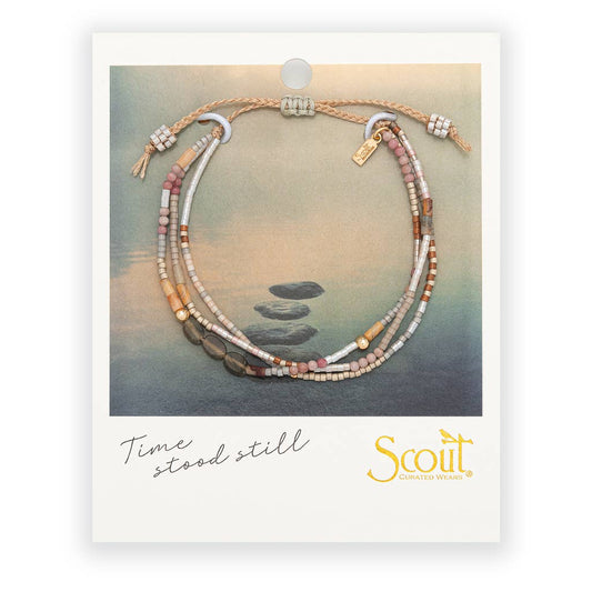 Bracelet with stones on a card featuring 'Scout' brand