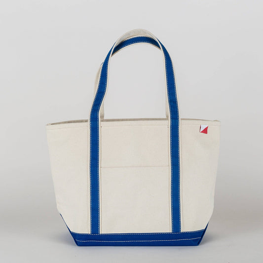 White tote bag with blue trim on a white background