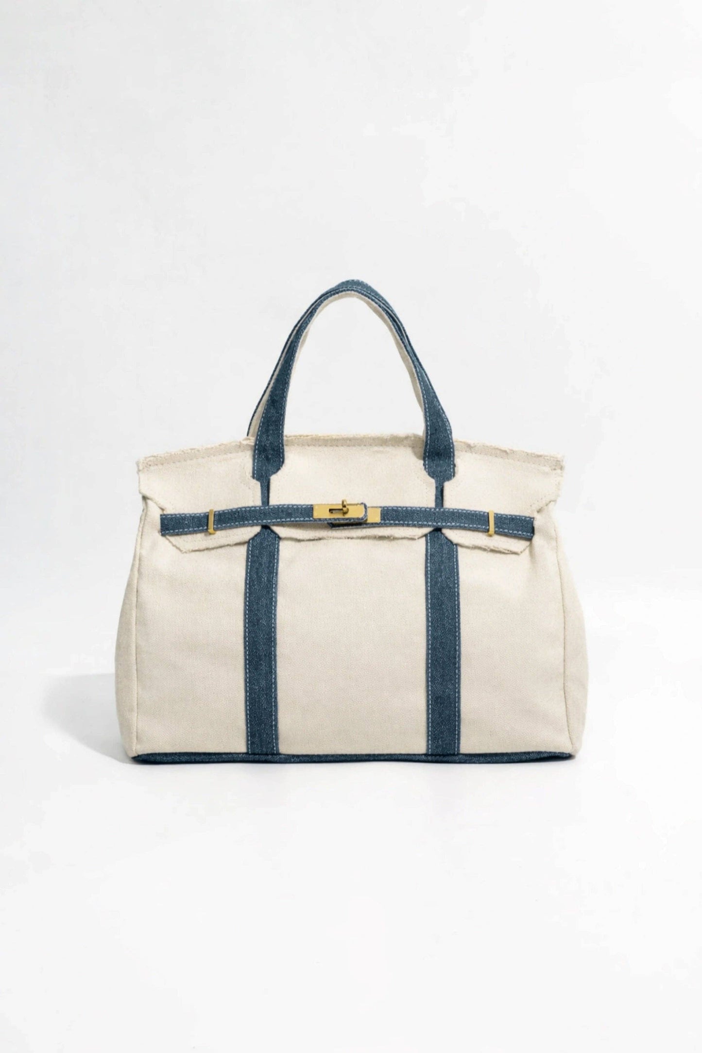 Beige tote bag with blue straps on a white background