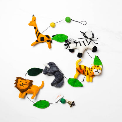 Garland with felt animal figures on a white background