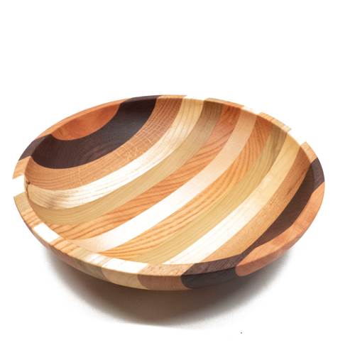 Wooden bowl with striped pattern on a white background
