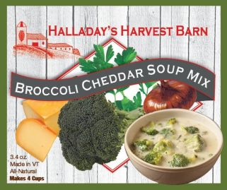 Halladay's Harvest Barn Broccoli Cheddar Soup Mix packaging with ingredients and a bowl of soup.