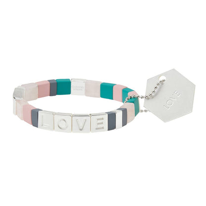Colorful bracelet with 'LOVE' tag on a white background