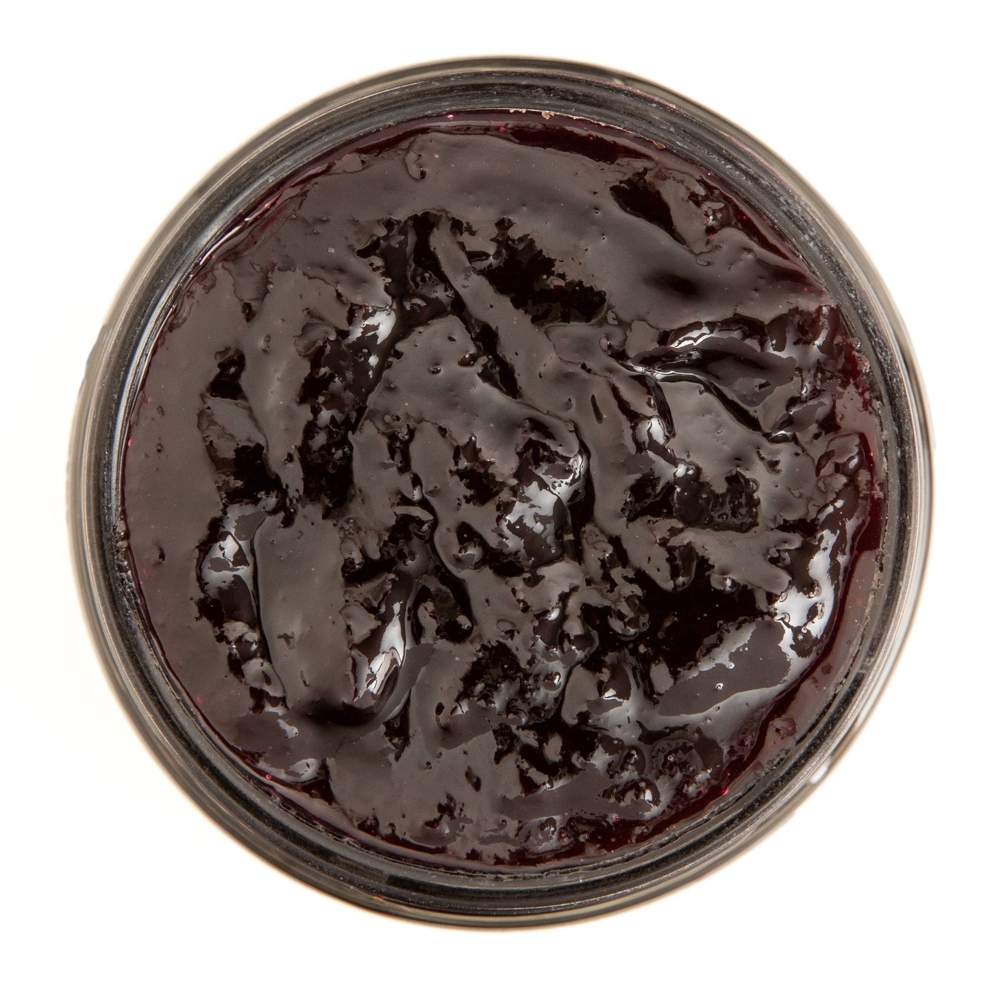 Open jar of Blake Hill Wild Blueberry on a white background