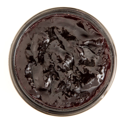 Open jar of Blake Hill Wild Blueberry on a white background