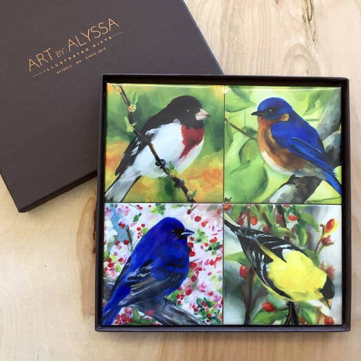 Set of bird-themed coasters in a box with 'Art by Alyssa' branding.