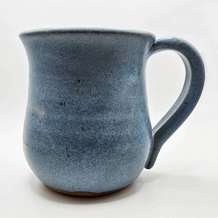 Blue ceramic mug on a white background