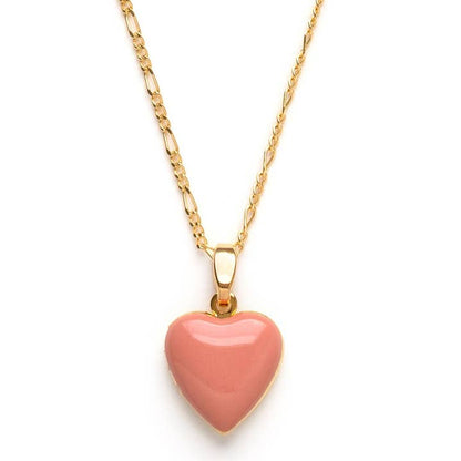 Pink heart-shaped pendant on a gold chain against a white background