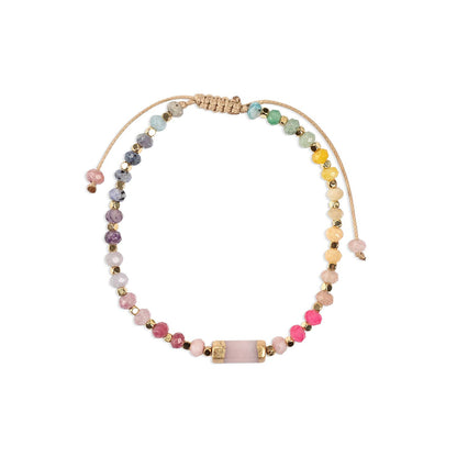 Multicolored beaded bracelets with gold accents and cord tie.