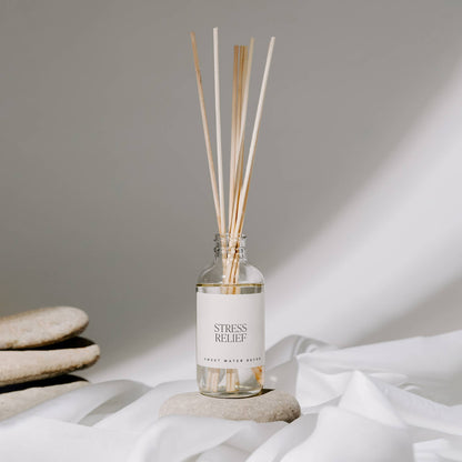 Reed diffuser labeled 'Stress Relief' on a neutral background.