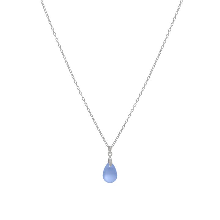 Necklace with a blue teardrop pendant on a white background