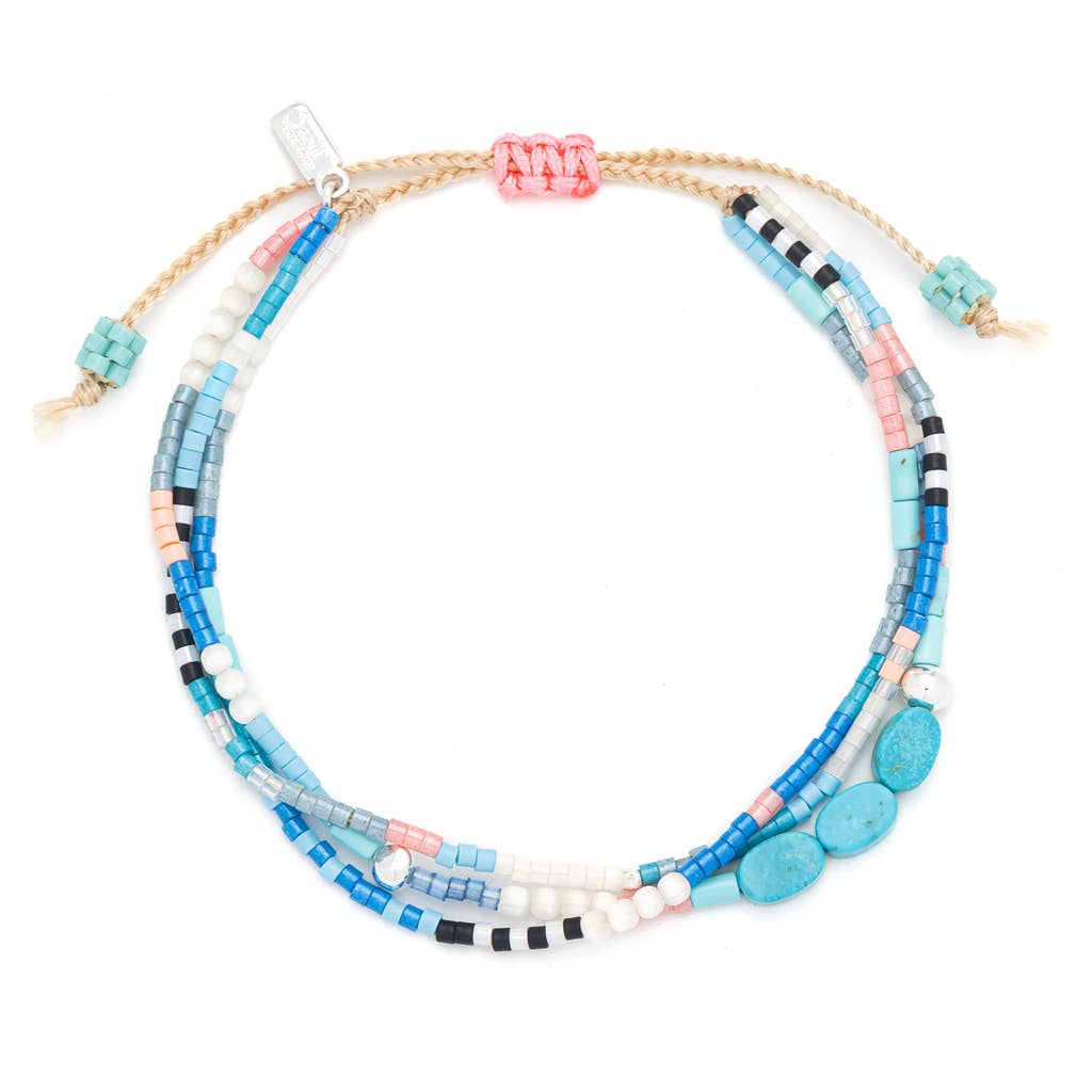 Multicolored beaded bracelet on a white background