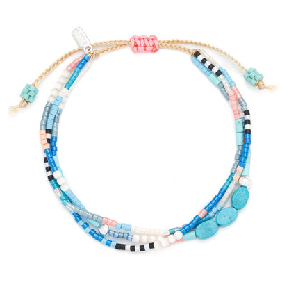 Multicolored beaded bracelet on a white background