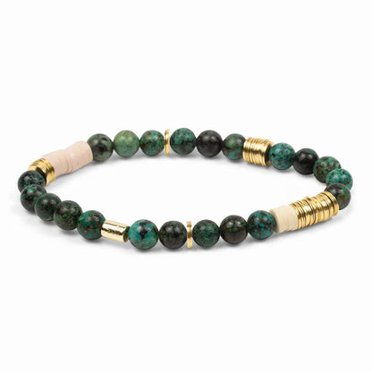 Beaded bracelet with green, black, and gold beads on a white background