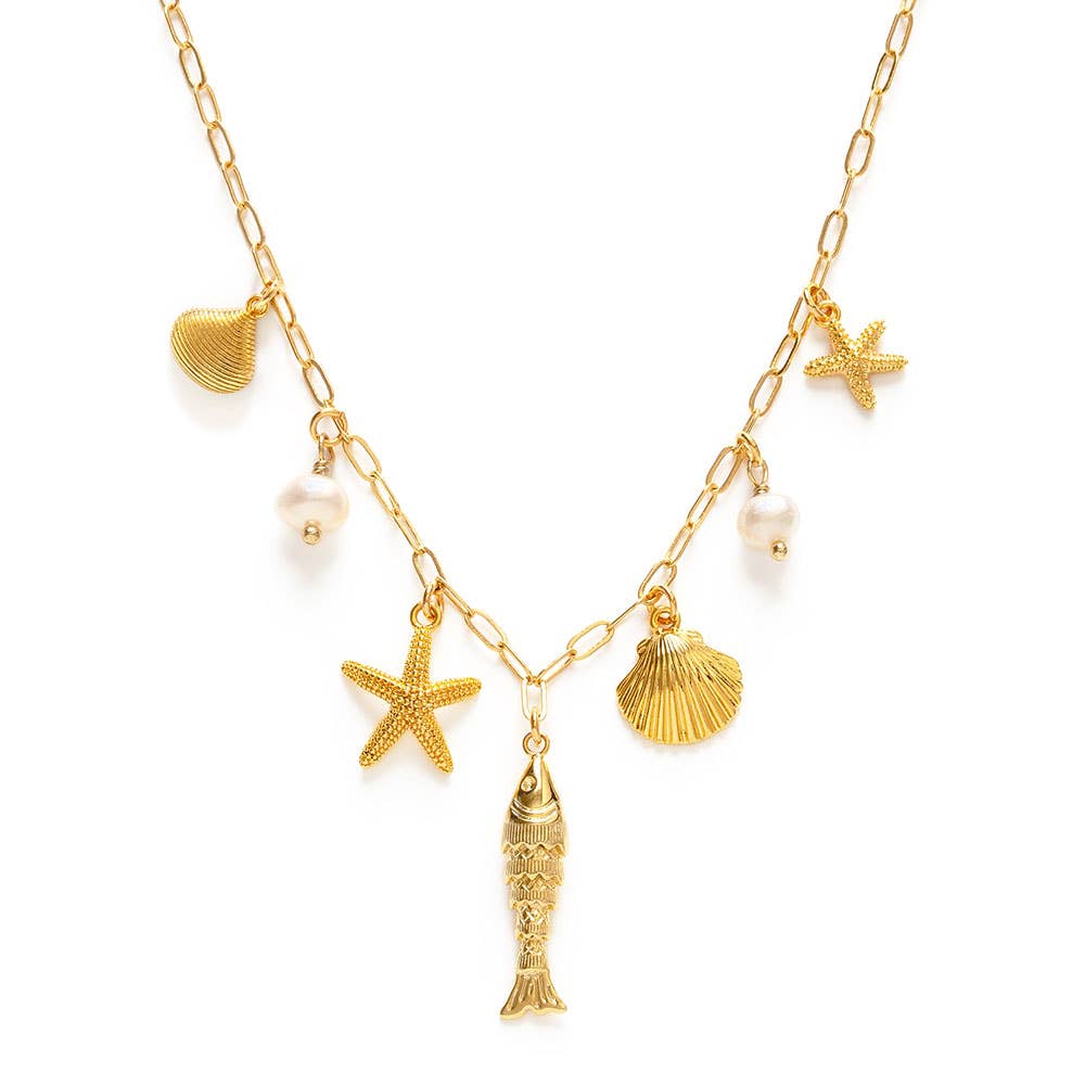 Gold necklace with starfish, shell, and fish charms on a white background