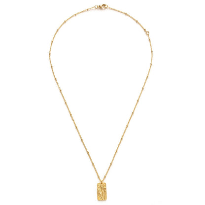 Gold necklace with a rectangular pendant on a white background
