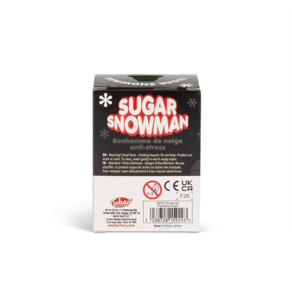 A boxed product labeled 'SUGAR SNOWMAN' on a plain white studio background. The box is mostly black and white with red lettering and small snowflake graphics.