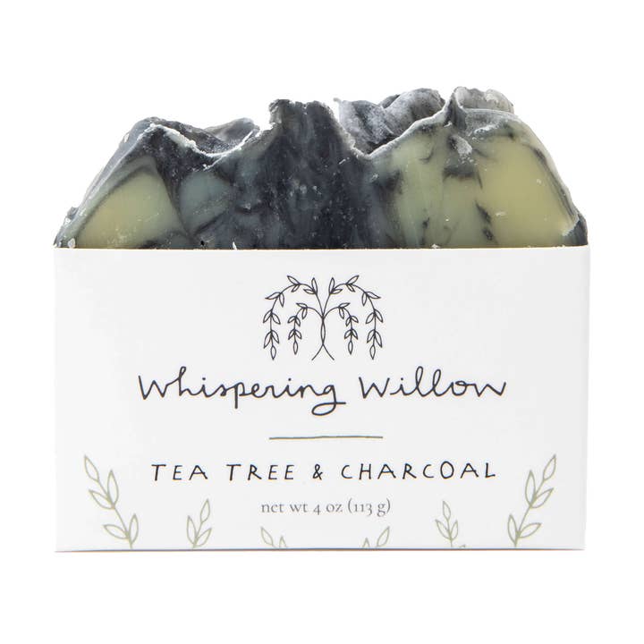 Bar of soap with 'Whispering Willow' branding on a white background
