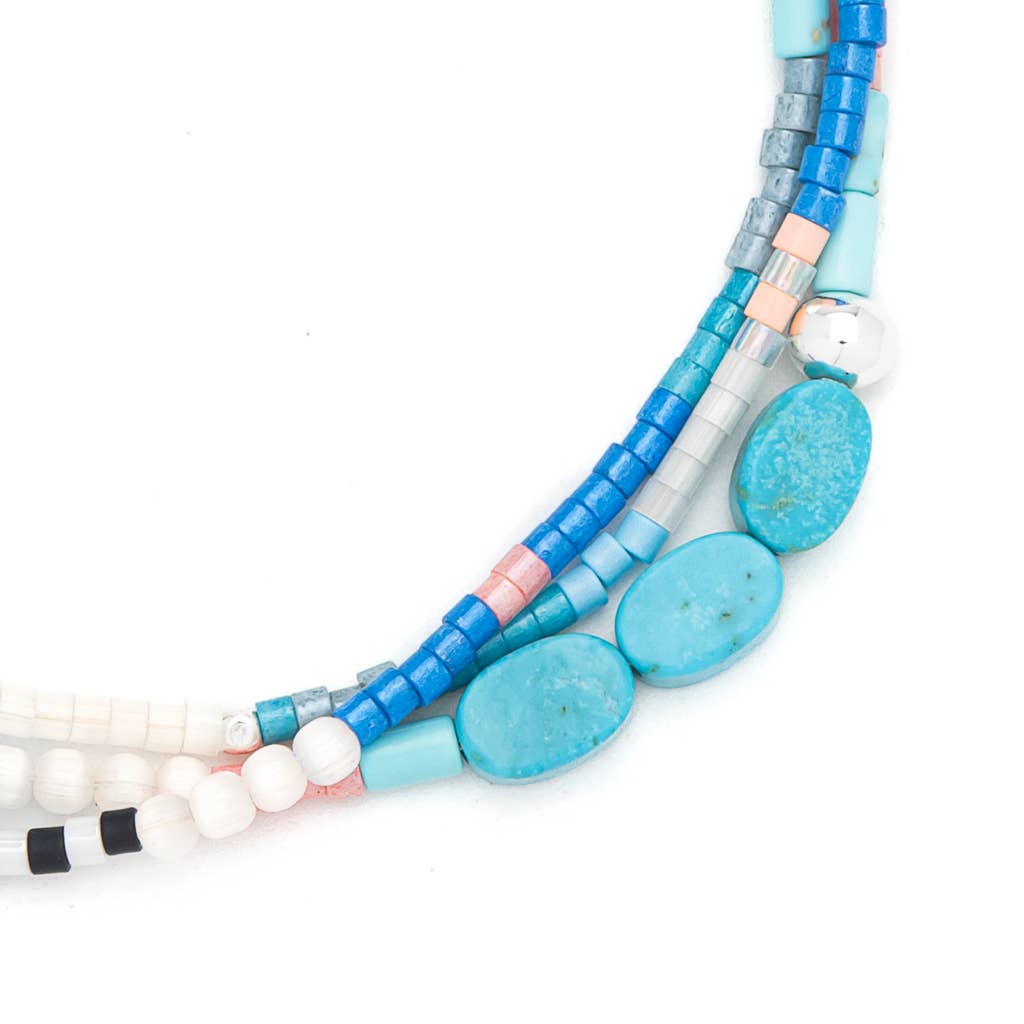 Colorful beaded bracelet on a white background