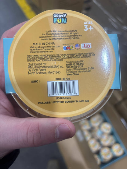 Crazy Fun toy packaging with a hand holding it, showing the back label.