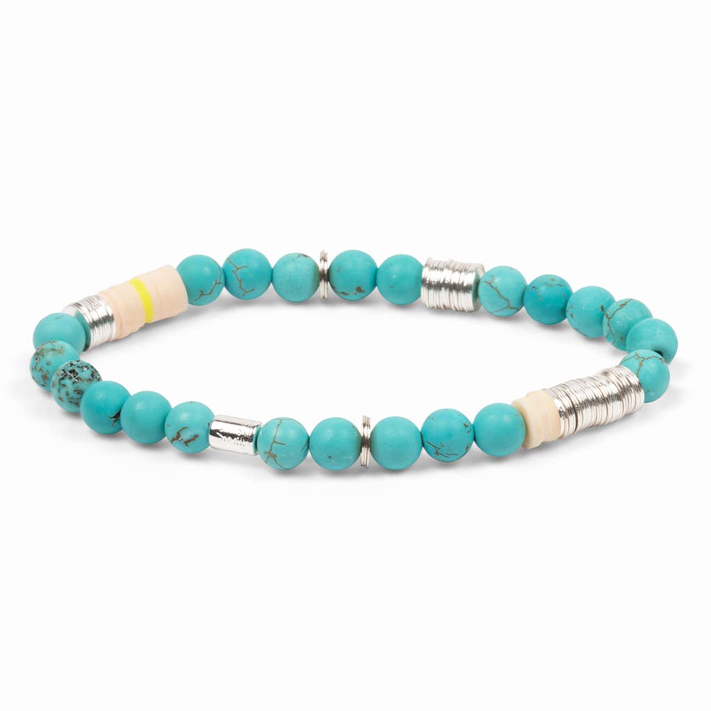 Turquoise beaded bracelet with silver and yellow accents on a white background