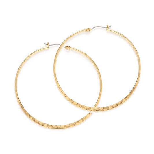 Gold hoop earrings on a white background