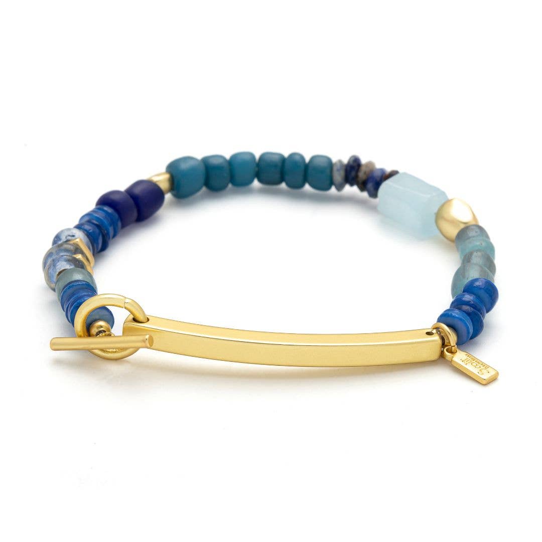 Beaded bracelet with blue and gold elements on a white background