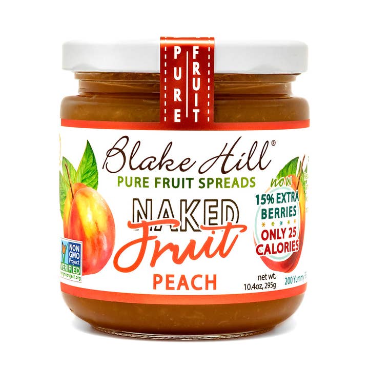 Jar of Blake Hill Peach Preserves with images of peaches and the text "Pure Fruit" "Now 15% Extra Berries, Only 25 Calories" on a white background.