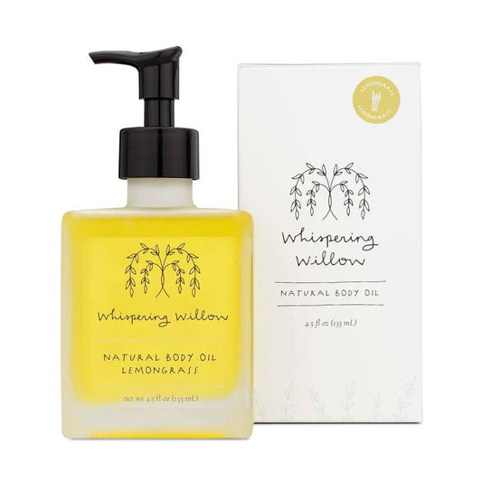 Bottle of 'Whispering Willow' natural body oil with pump and matching box on a white background