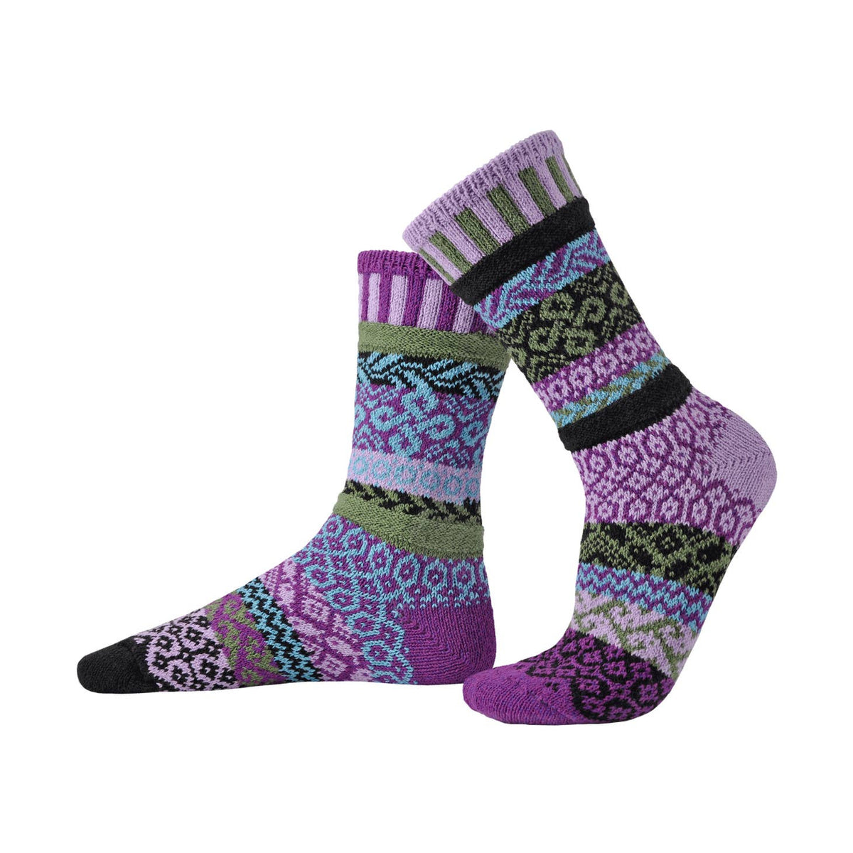 A pair of crew socks with a complex multicolor knit pattern featuring purple, green, blue, and black sections, displayed against a plain white background.