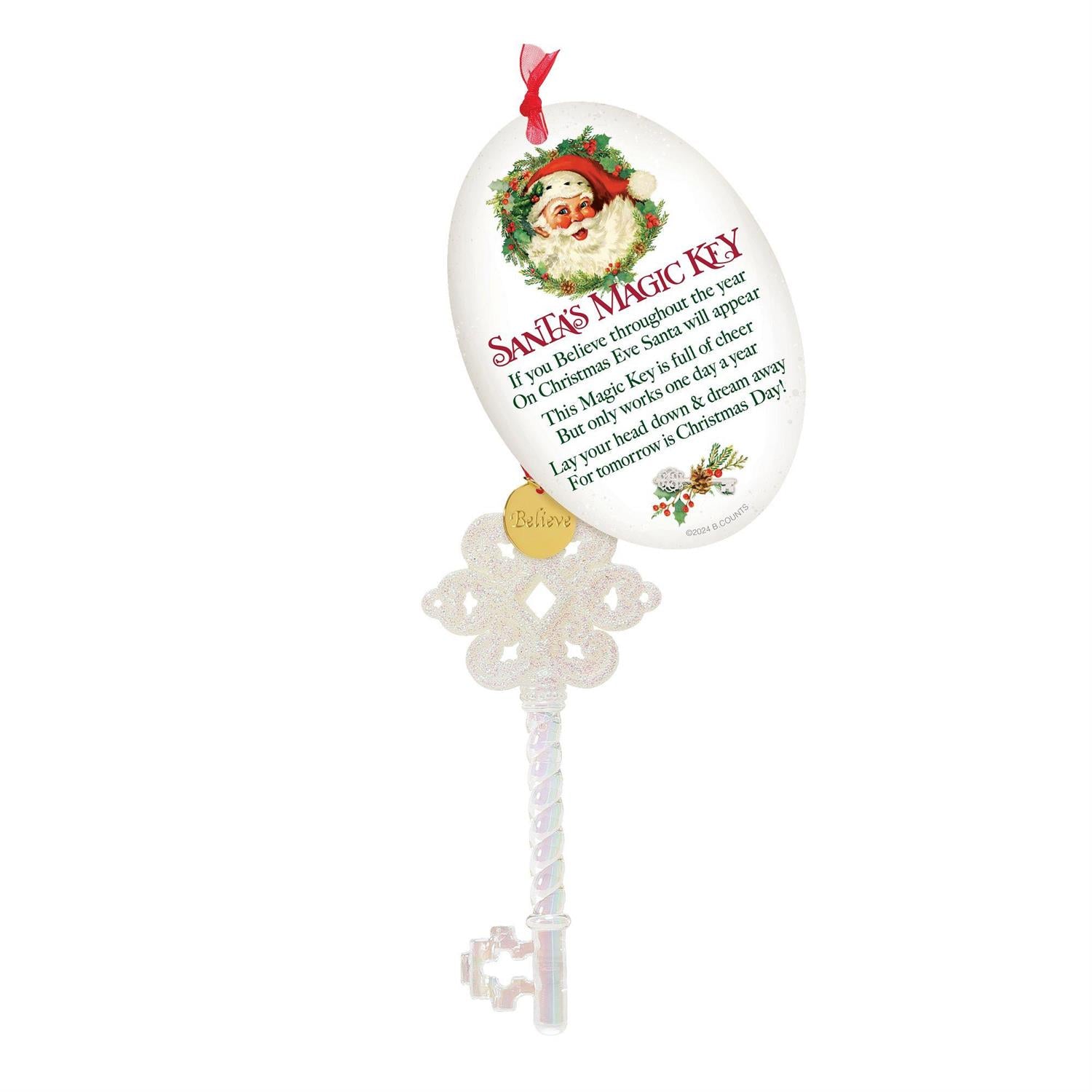 Decorative key ornament with Santa Claus illustration and text on a white background