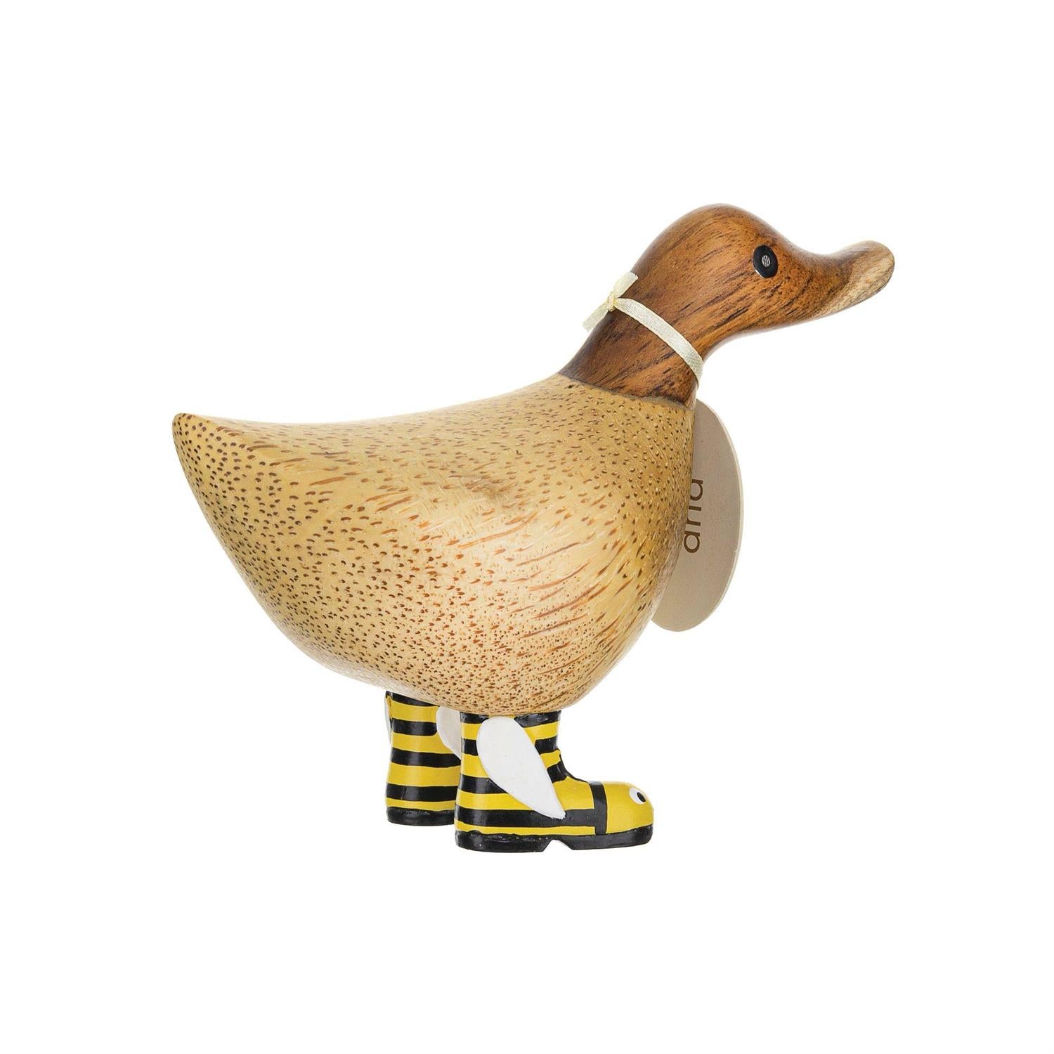 Wooden duck figure with a tag on a white background