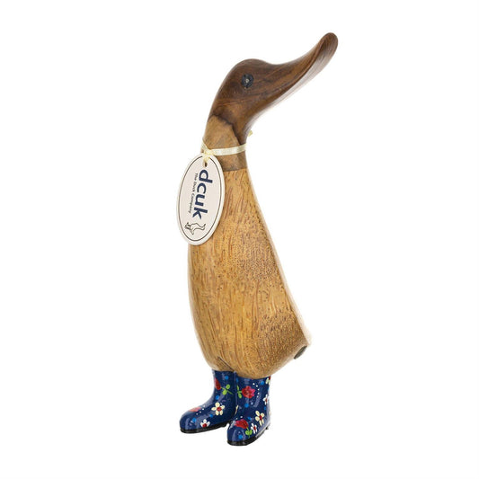 Wooden duck figurine with floral-patterned boots on a white background