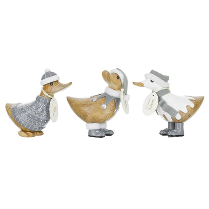 Three wooden duck figurines with white and gray accents on a white background
