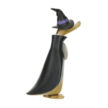Back side of a wooden duck figurine with a black jacket and hat with purple trim on a white background