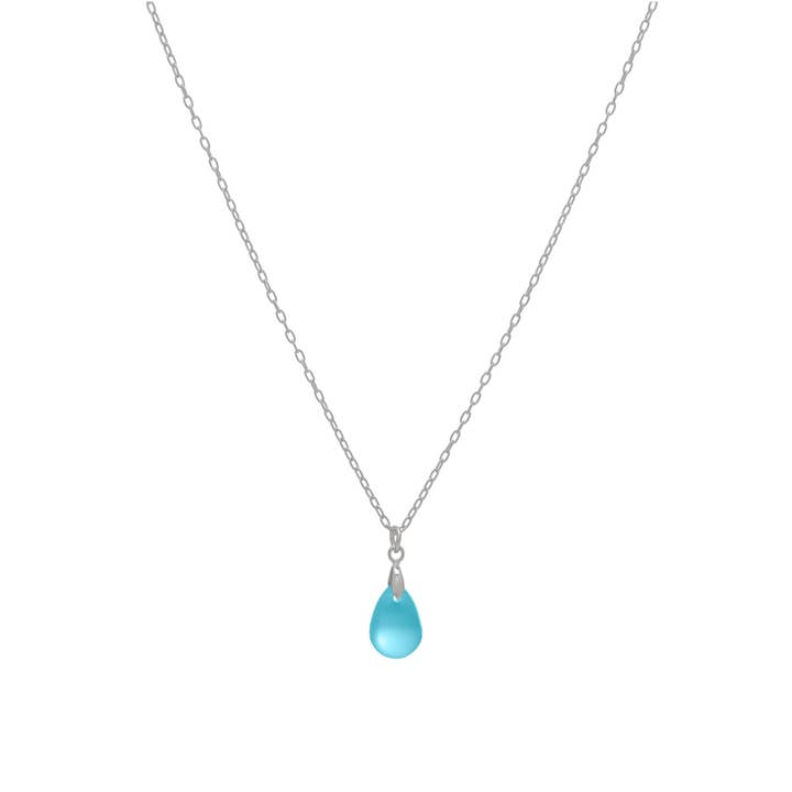 Necklace with a turquoise blue teardrop pendant on a white background