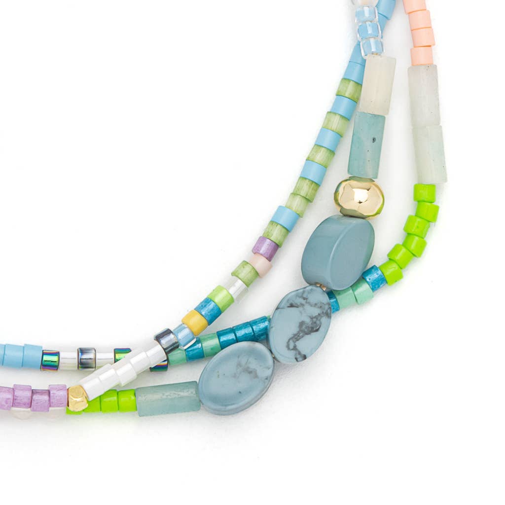 Colorful beaded bracelet on a white background