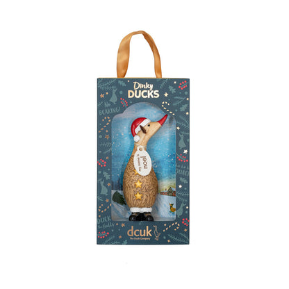 Boxed Dinky Duck wearing a red santa hat on a white background