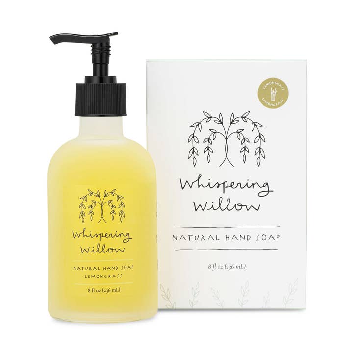 Bottle of Whispering Willow natural hand soap with pump and packaging on a white background