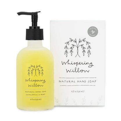 Bottle of 'Whispering Willow' natural hand soap with pump and matching box on a white background