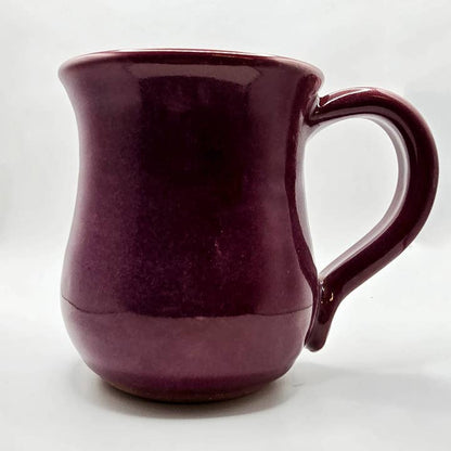 Purple mug on a white background