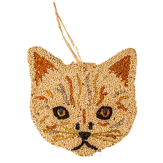 Cat-shaped seed ornament on a white background