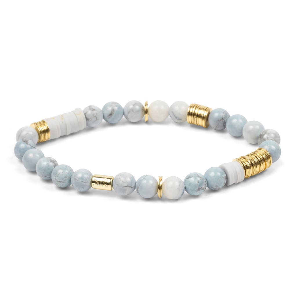 Beaded bracelet with gold accents on a white background