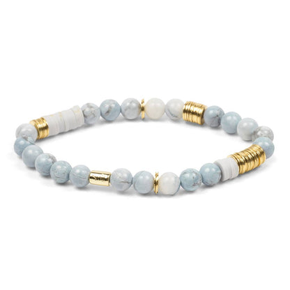 Beaded bracelet with gold accents on a white background